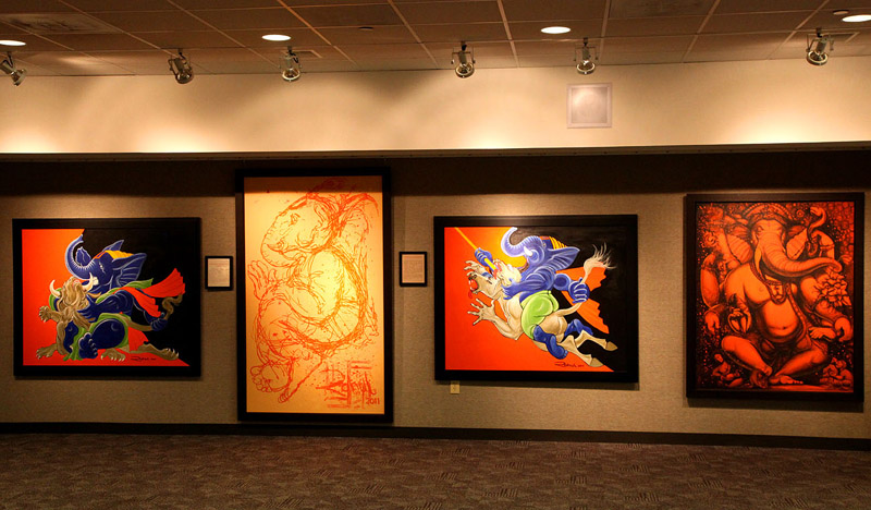 Rahul's
                paintings in the gallery.
