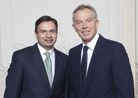 Rajeev with
                Tony Blair